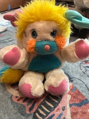 Colorful Plush Cuddly Animal Toy - Yellow, Teal, Pink